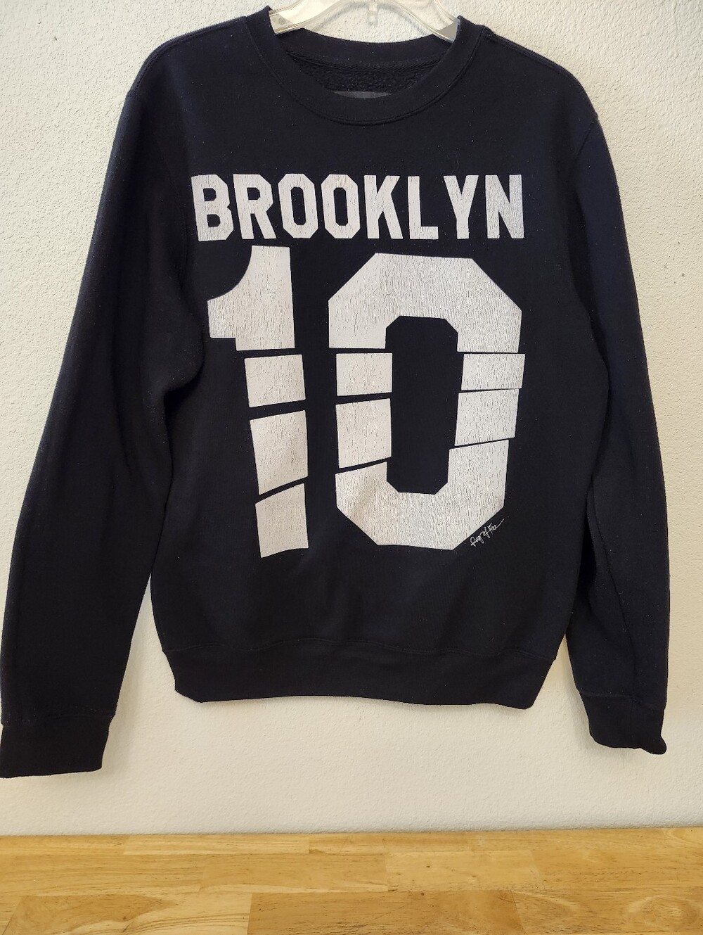 Ring of Fire Black Crewneck Sweatshirt with White 'Brooklyn 10' Graphic